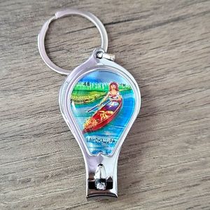 Nail clipper/ bottle opener